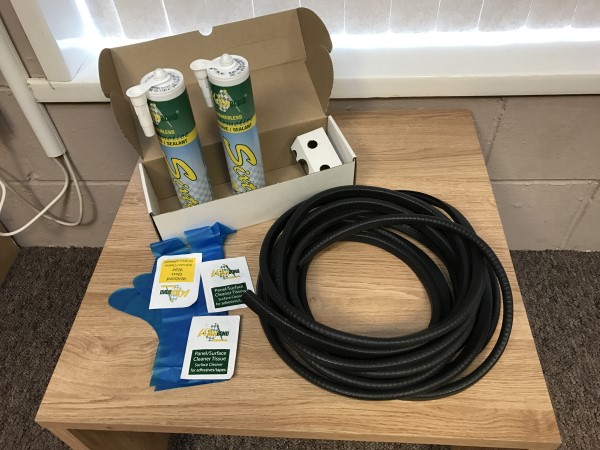 Double fixing kit for bonded windows